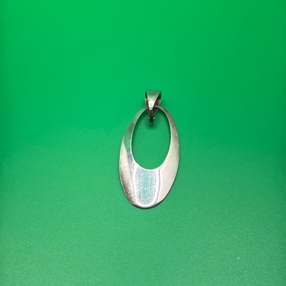 Sterling silver pendant.
